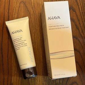 AHAVA Purifying Mud Mask and Essential Day Moisturizer in sealed container tubes